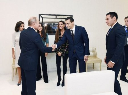 İlham Əliyev və Putin cüdo yarışlarını izləyib